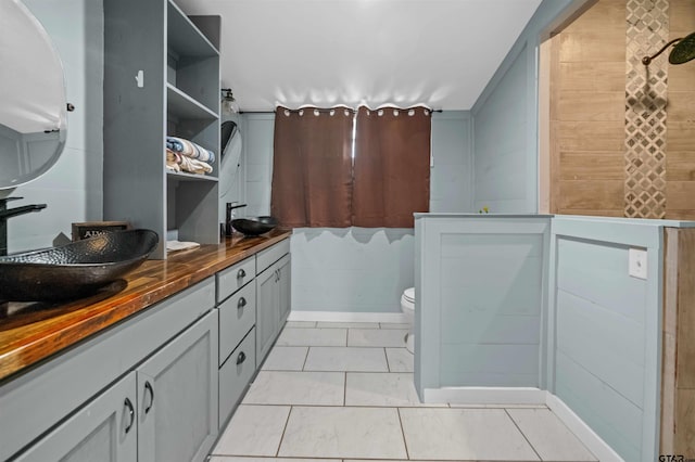 1325 Fm 23 W, Rusk, TX 75785 - bathroom with double vanity and toilet
