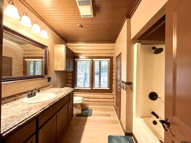 full bathroom featuring wood-type flooring, ornamental molding, vanity, toilet, and wooden ceiling