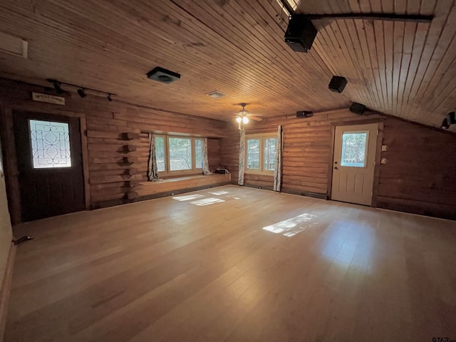 bonus room featuring hardwood / wood-style floors, log walls, plenty of natural light, and wooden ceiling