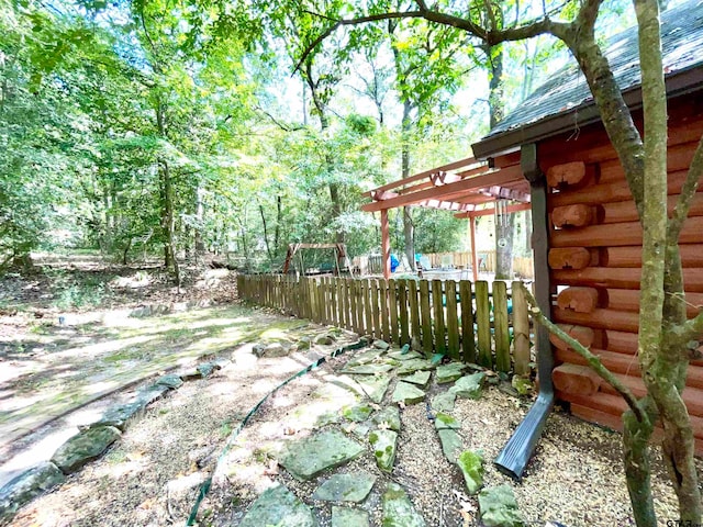 view of yard with a pergola