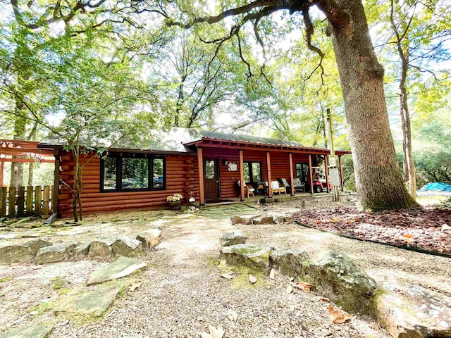 log home with a patio