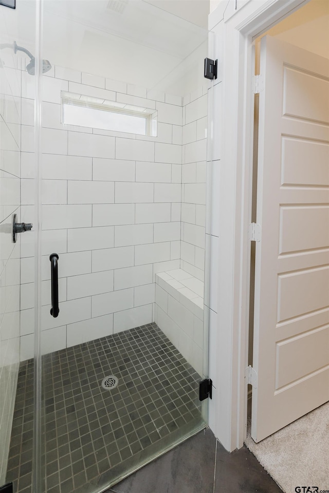 bathroom with a stall shower