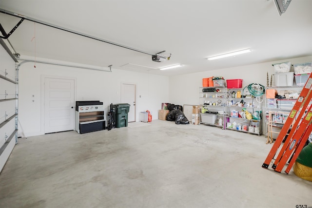 garage featuring a garage door opener