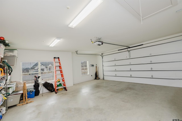 garage featuring a garage door opener