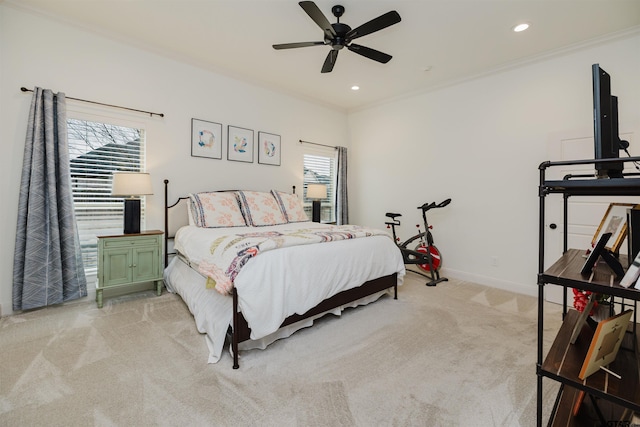 bedroom with baseboards, recessed lighting, ceiling fan, light carpet, and crown molding