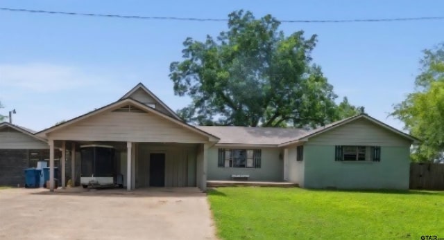 507 Bascom Rd, Whitehouse, TX 75791 - ranch-style house featuring driveway, a front yard, and a carport