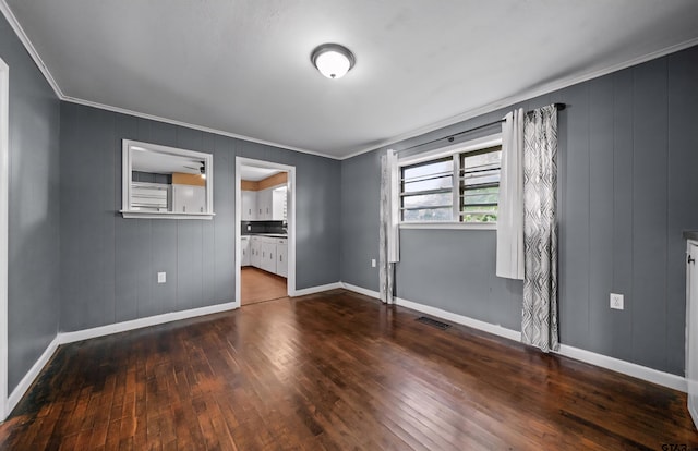 507 Bascom Rd, Whitehouse, TX 75791 - unfurnished room featuring hardwood / wood-style flooring and crown molding