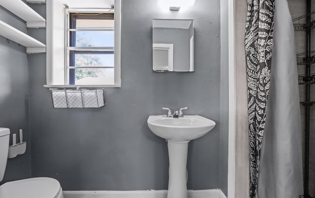 507 Bascom Rd, Whitehouse, TX 75791 - bathroom with toilet and baseboards