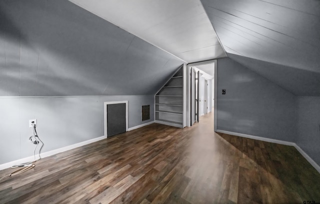 507 Bascom Rd, Whitehouse, TX 75791 - bonus room with built in features, lofted ceiling, and wood finished floors