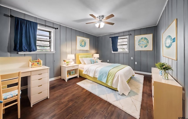 507 Bascom Rd, Whitehouse, TX 75791 - bedroom with dark wood finished floors, a ceiling fan, a decorative wall, and an office area