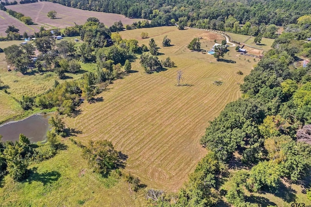 birds eye view of property featuring a rural view