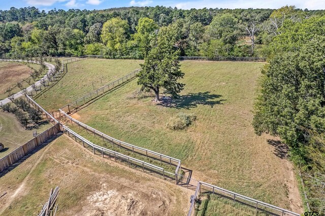 birds eye view of property with a rural view and a forest view