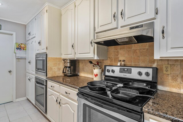 110 Leisure Ln, Whitehouse, TX 75791 - kitchen featuring backsplash, white cabinets, appliances with stainless steel finishes, and under cabinet range hood