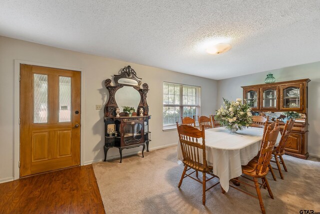 110 Leisure Ln, Whitehouse, TX 75791 - dining area with baseboards and a textured ceiling