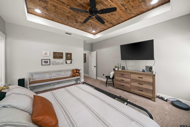 15920 Shepards Gln, Lindale, TX 75771 - carpeted bedroom featuring visible vents, baseboards, a tray ceiling, recessed lighting, and wooden ceiling