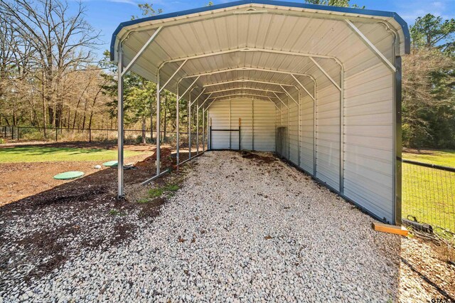 15920 Shepards Gln, Lindale, TX 75771 - view of vehicle parking with a carport and fence