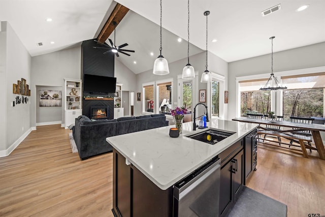 15920 Shepards Gln, Lindale, TX 75771 - kitchen with visible vents, ceiling fan with notable chandelier, a sink, light wood-style floors, and dishwashing machine
