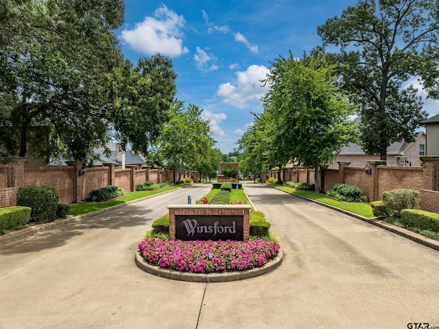 7022 Walden Dr, Tyler, TX 75703 - community / neighborhood sign with a residential view and curved driveway