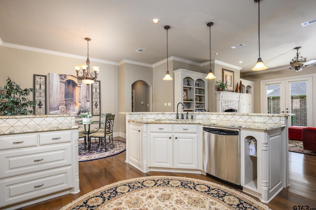 7022 Walden Dr, Tyler, TX 75703 - kitchen featuring stainless steel dishwasher, dark wood finished floors, a chandelier, crown molding, and a center island with sink