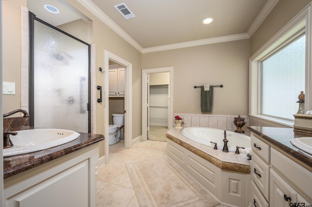 7022 Walden Dr, Tyler, TX 75703 - full bath featuring a shower stall, a garden tub, ornamental molding, vanity, and tile patterned flooring