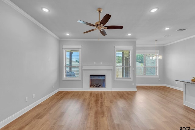 19175 Seneca Dr, Flint, TX 75762 - unfurnished living room featuring recessed lighting, a fireplace, light wood finished floors, ceiling fan, and crown molding