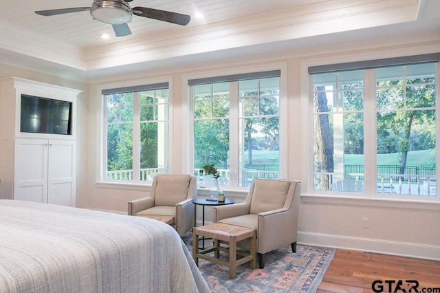 bedroom featuring crown molding, baseboards, wood finished floors, and recessed lighting