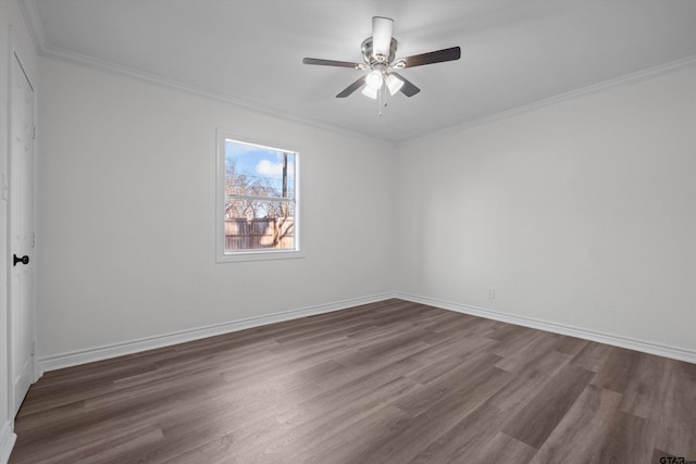 unfurnished room with ornamental molding, dark hardwood / wood-style floors, and ceiling fan