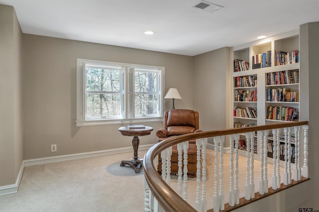 interior space featuring carpet, visible vents, baseboards, and recessed lighting