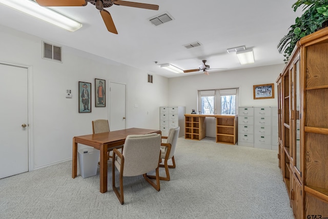 dining area featuring carpet flooring and visible vents