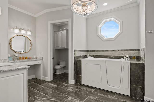 bathroom with a tub, toilet, a notable chandelier, vanity, and crown molding