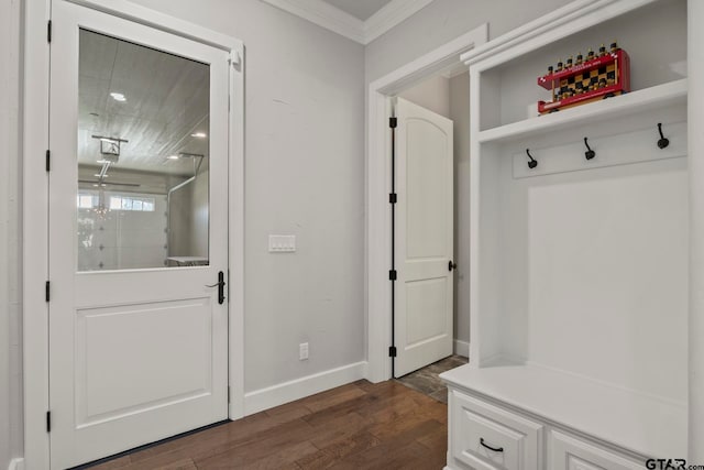 mudroom with dark wood-type flooring and ornamental molding