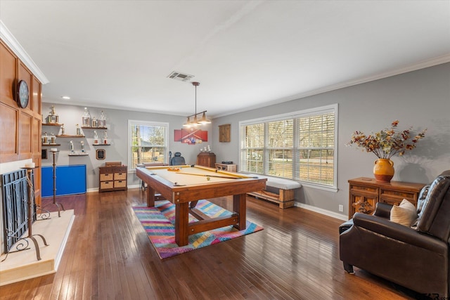 game room with ornamental molding, dark wood-type flooring, and billiards