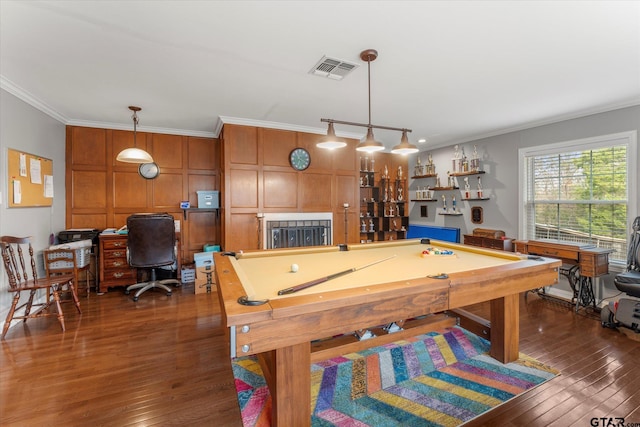 playroom featuring billiards, ornamental molding, and dark hardwood / wood-style floors