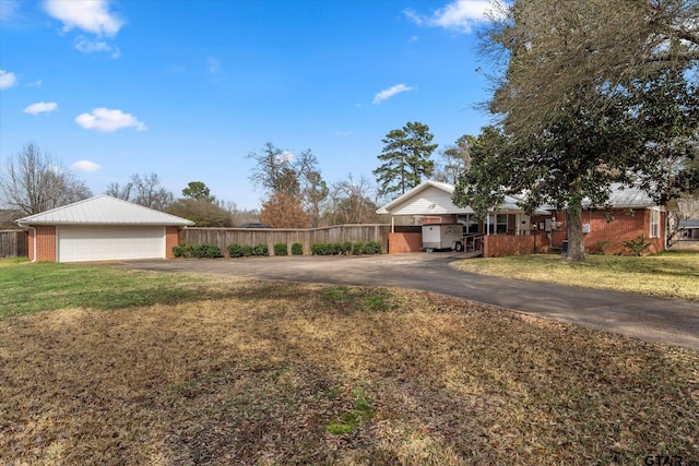 exterior space with a front lawn and a garage