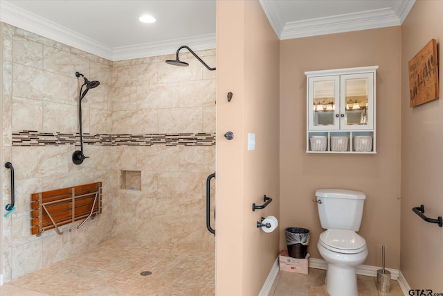 bathroom with ornamental molding, a tile shower, and toilet