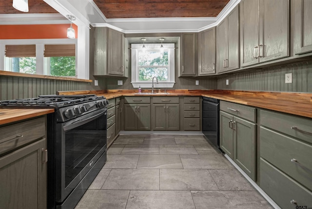 230 N Henderson St, Rusk, TX 75785 - kitchen featuring butcher block countertops, dishwasher, a sink, stainless steel range with gas cooktop, and gray cabinets