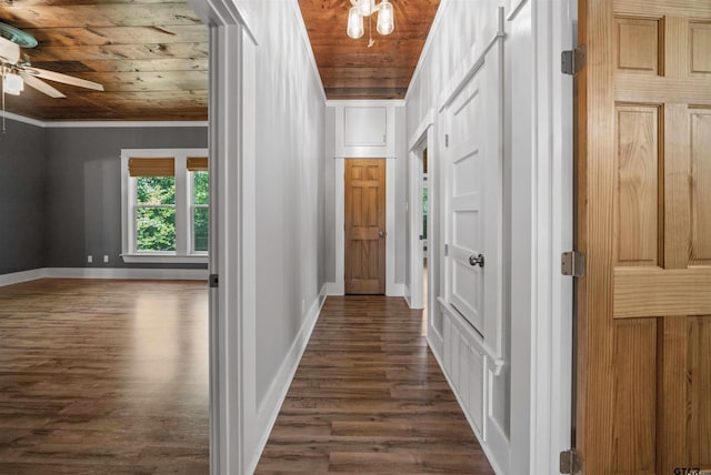 230 N Henderson St, Rusk, TX 75785 - corridor featuring crown molding, dark wood-style flooring, wood ceiling, and baseboards
