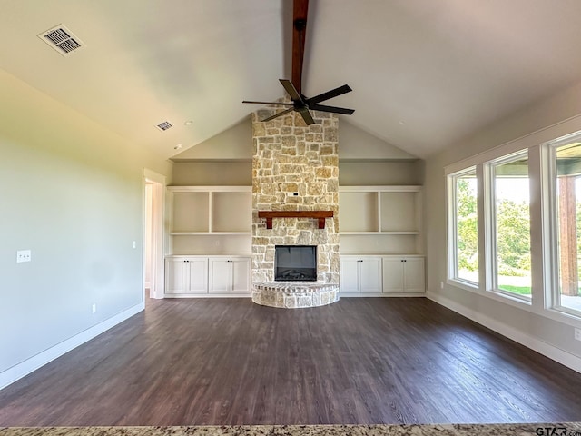 7449 Crk 314, Henderson, TX 75652 - unfurnished living room featuring ceiling fan, dark wood-style floors, baseboards, high vaulted ceiling, and a stone fireplace