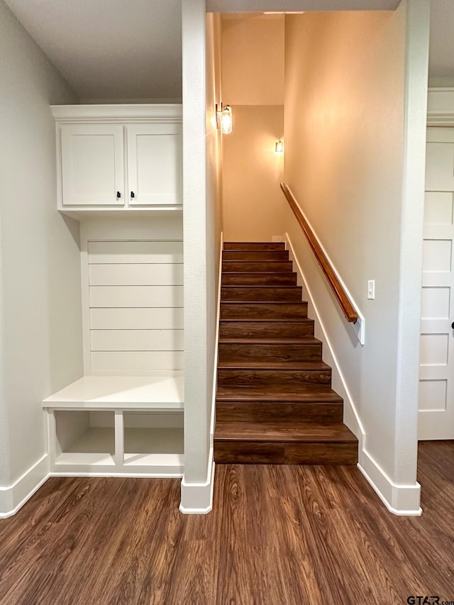 7449 Crk 314, Henderson, TX 75652 - staircase with baseboards and wood finished floors
