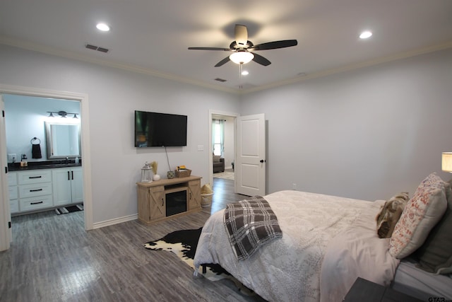 19379 Cedarpark Pl, Lindale, TX 75771 - bedroom featuring crown molding, dark wood finished floors, recessed lighting, a ceiling fan, and ensuite bathroom