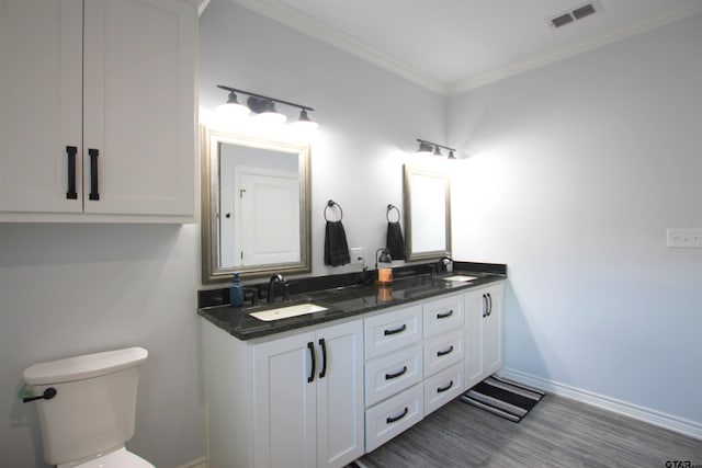 19379 Cedarpark Pl, Lindale, TX 75771 - bathroom featuring double vanity, crown molding, and wood finished floors