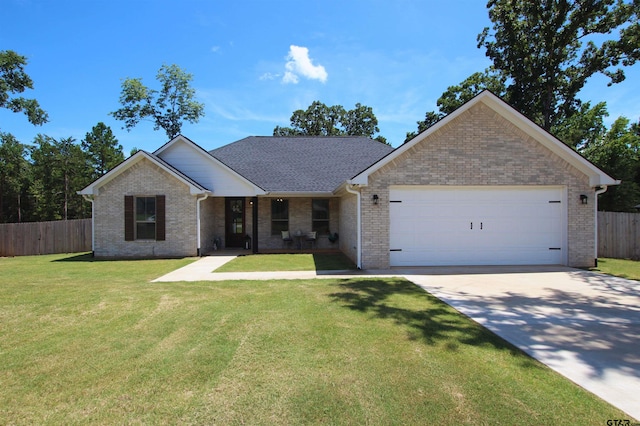 19379 Cedarpark Pl, Lindale, TX 75771 - single story home with a garage, brick siding, covered porch, and concrete driveway