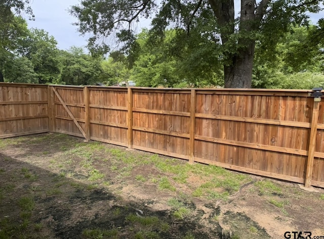 view of yard with fence