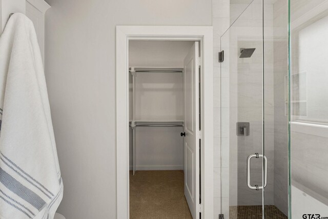 bathroom with an enclosed shower