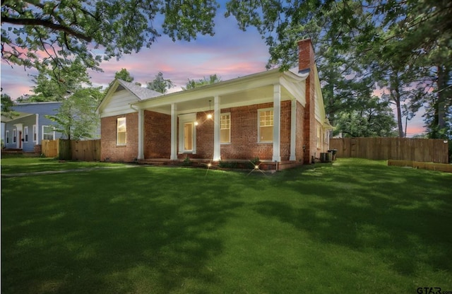 705 S Vine Ave, Tyler, TX 75701 - single story home with a chimney and brick siding