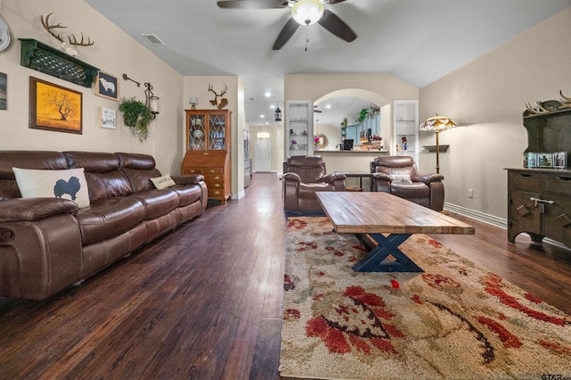 2531 Guinn Farms Rd, Tyler, TX 75707 - living area with wood finished floors, a ceiling fan, vaulted ceiling, and baseboards