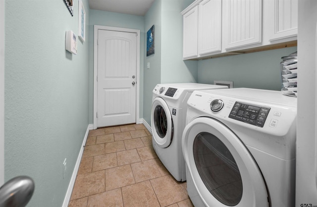 2531 Guinn Farms Rd, Tyler, TX 75707 - clothes washing area with cabinet space, separate washer and dryer, and baseboards