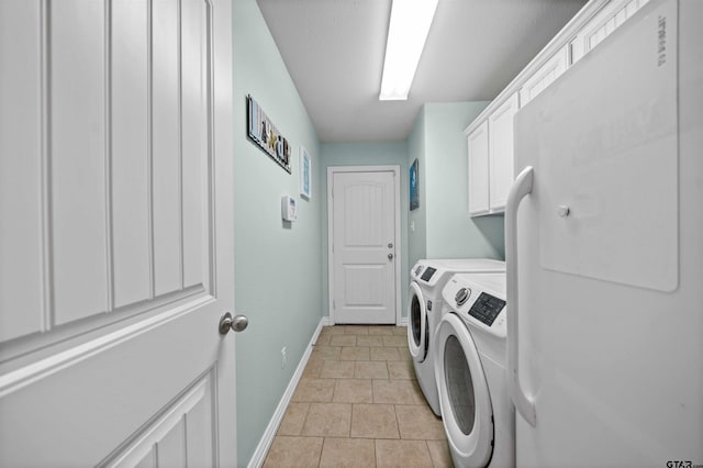 2531 Guinn Farms Rd, Tyler, TX 75707 - laundry room featuring washer and dryer, baseboards, and cabinet space