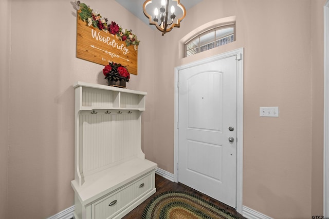 2531 Guinn Farms Rd, Tyler, TX 75707 - mudroom with a chandelier, baseboards, and dark wood-style flooring
