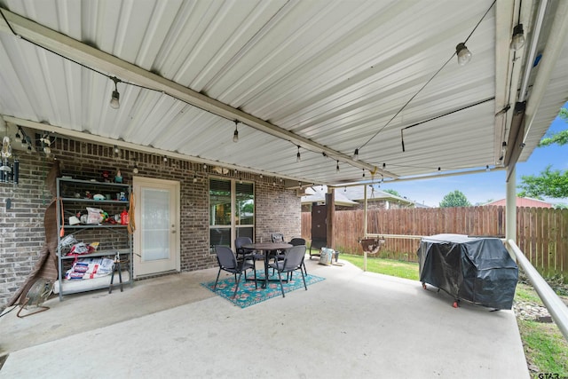 2531 Guinn Farms Rd, Tyler, TX 75707 - view of patio / terrace featuring fence, area for grilling, and outdoor dining area